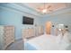 Spacious main bedroom with light walls and walk-in closet at 625 Whispering Pines Ct., Murrells Inlet, SC 29576
