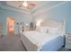 Serene main bedroom with ample space, soft lighting, and a ceiling fan at 625 Whispering Pines Ct., Murrells Inlet, SC 29576