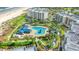 Wonderful aerial view showcases the pool and lazy river for these beachfront condos at 645 Retreat Beach Circle # A-2-C, Pawleys Island, SC 29585