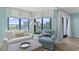 Living room with ocean views, comfortable seating, and natural light at 645 Retreat Beach Circle # A-2-C, Pawleys Island, SC 29585