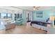 Relaxing main bedroom with a sitting area and ocean views at 645 Retreat Beach Circle # A-2-C, Pawleys Island, SC 29585