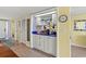 This wet bar features a sink, storage and beautiful countertop at 645 Retreat Beach Circle # A-2-C, Pawleys Island, SC 29585