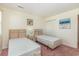 Bedroom featuring two twin beds, neutral walls, and closet doors at 665 Tupelo Ln. # 17-F, Longs, SC 29568