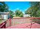 Backyard with large storage shed on a sunny day with a red porch at 703 S 21St Ave. S, North Myrtle Beach, SC 29582