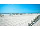 Wide angle shot of the beach, umbrellas, and ocean at 703 S 21St Ave. S, North Myrtle Beach, SC 29582