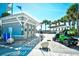 Beach access building with green golf cart parked to the side on a sunny day at 703 S 21St Ave. S, North Myrtle Beach, SC 29582