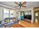 Bright living room showing the entrance, a comfortable sofa, and a parquet wood floor at 703 S 21St Ave. S, North Myrtle Beach, SC 29582