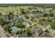 An aerial view of a residential neighborhood with mature trees and landscaping, near the golf course at 706 Chippendale Dr., Myrtle Beach, SC 29588