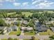 An aerial view of a lovely neighborhood situated adjacent to a lush green golf course at 706 Chippendale Dr., Myrtle Beach, SC 29588
