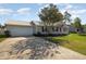 A charming single-story home featuring a well-manicured lawn and an attached two car garage at 706 Chippendale Dr., Myrtle Beach, SC 29588