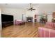 Cozy living room with a fireplace, vaulted ceilings, and wood laminate flooring at 706 Chippendale Dr., Myrtle Beach, SC 29588