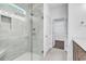 Modern bathroom features a glass enclosed shower with grey tile and a built-in niche at 718 Highway 348, Loris, SC 29569
