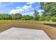 Scenic backyard view featuring a pond and green spaces, creating a tranquil setting at 722 Highway 348, Loris, SC 29569