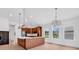 Modern kitchen with wood cabinets, a large island, pendant lighting and stainless steel appliances at 722 Highway 348, Loris, SC 29569
