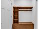 Mudroom featuring wooden shelving and bench space near a white door at 722 Highway 348, Loris, SC 29569