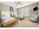 Charming bedroom with twin beds, neutral walls, and plantation shutters allowing for plenty of natural light at 77 Streater Ln., Pawleys Island, SC 29585