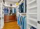 Walk-in closet with custom shelving provides ample storage for clothes and accessories at 77 Streater Ln., Pawleys Island, SC 29585