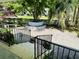Front yard with unique tree feature, bench seating, and maintained garden at 801 Talbot Circle, Myrtle Beach, SC 29577