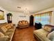 Cozy living room featuring hardwood floors, decorative lighting, and comfortable couches at 801 Talbot Circle, Myrtle Beach, SC 29577