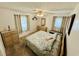 A bright bedroom with a comfortable bed, soft lighting, and charming decor at 801 Talbot Circle, Myrtle Beach, SC 29577