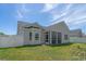 Lovely screened porch on a well maintained backyard with a white picket fence at 804 Twickenham Loop, Longs, SC 29568