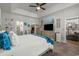 Carpeted bedroom features an en suite bath and a walk in closet at 804 Twickenham Loop, Longs, SC 29568