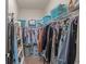 Walk-in closet provides ample storage with shelving and hanging racks at 804 Twickenham Loop, Longs, SC 29568