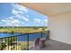 Relax on this balcony with comfortable furniture and water view at 8121 Amalfi Pl. # 4-801, Myrtle Beach, SC 29572