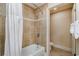 Bathroom featuring tiled shower and tub with neutral decor at 8121 Amalfi Pl. # 4-801, Myrtle Beach, SC 29572