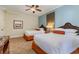 Comfortable bedroom featuring two beds, soft lighting, and stylish decor at 8121 Amalfi Pl. # 4-801, Myrtle Beach, SC 29572