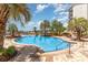 Relax at this beautiful pool that is surrounded by palm trees, lounge chairs, and tables with comfortable seating at 8121 Amalfi Pl. # 4-801, Myrtle Beach, SC 29572