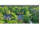 Beautiful home with landscaped yard nestled among mature trees and overlooking golf course at 813 Bear Lake Dr., Longs, SC 29568