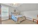 Bright bedroom with a cozy bed and a window providing natural light at 813 Bear Lake Dr., Longs, SC 29568