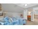 Cozy bedroom featuring a comfortable bed, bedside table, and neutral decor at 813 Bear Lake Dr., Longs, SC 29568