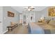 Spacious bedroom featuring a chair, a bed and a bathroom through the doorway at 813 Bear Lake Dr., Longs, SC 29568