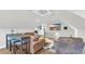 Open living room with a beach view TV and a comfortable brown leather couch and chair at 813 Bear Lake Dr., Longs, SC 29568