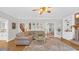 Another angle of the living room showcasing hardwood floors and view of the staircase at 813 Bear Lake Dr., Longs, SC 29568