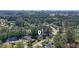 Aerial view of a home nestled in a lush, green neighborhood near the coastline at 88 Purple Martin Dr., Murrells Inlet, SC 29576
