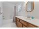 Bathroom with a shower/tub combo, a sink with vanity, and an octagon-shaped mirror at 88 Purple Martin Dr., Murrells Inlet, SC 29576