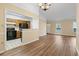 Open-concept layout with hardwood floors connecting the kitchen and living area at 88 Purple Martin Dr., Murrells Inlet, SC 29576