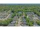 Aerial view of neighborhood with lush landscaping, swimming pool, and view of the ocean at 900 Courtyard Dr. # K7, Myrtle Beach, SC 29577