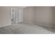 Bedroom featuring neutral carpet with bathroom access at 900 Courtyard Dr. # K7, Myrtle Beach, SC 29577