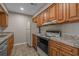 Efficient kitchen space with wood cabinets and updated appliances at 900 Courtyard Dr. # K7, Myrtle Beach, SC 29577