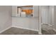 Galley kitchen with wood cabinets and stainless steel appliances at 900 Courtyard Dr. # K7, Myrtle Beach, SC 29577