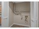 Small laundry closet with access to hookups and overhead shelf at 900 Courtyard Dr. # K7, Myrtle Beach, SC 29577