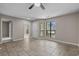 Open living area with tiled floors, large window, and access to other rooms, creating an inviting space at 900 Courtyard Dr. # K7, Myrtle Beach, SC 29577