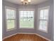 A breakfast nook is surrounded by three windows overlooking the outdoors at 908 Hornbeam Ct., Loris, SC 29569