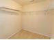 Walk in closet featuring ample shelving and storage at 908 Hornbeam Ct., Loris, SC 29569