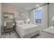 Charming bedroom with pastel accents, a study desk, and a picturesque window view at 945 Laconic Dr., Myrtle Beach, SC 29588