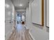 Hallway with wood floors leading to a view of the living room at 945 Laconic Dr., Myrtle Beach, SC 29588